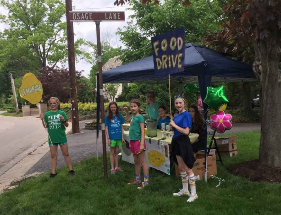 Kids at a lemonade stand for SHIM