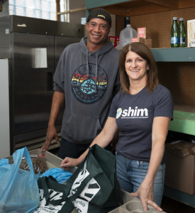 Food pantry client Bobby with volunteer Lynne