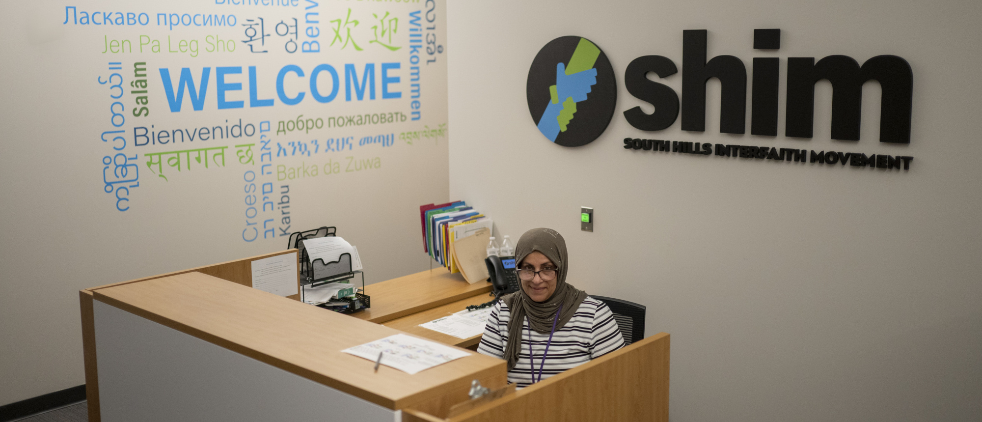 Jinan at Family Center front desk Jinan at Family Center front desk