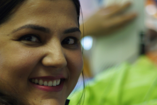 Sewing woman smiling