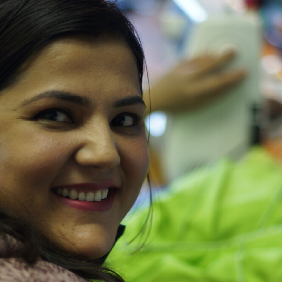 Sewing woman smiling