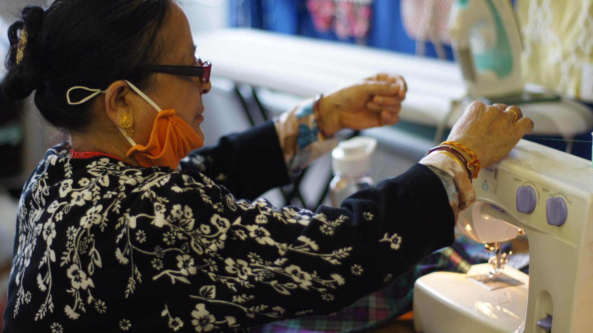 Woman sewing Woman sewing
